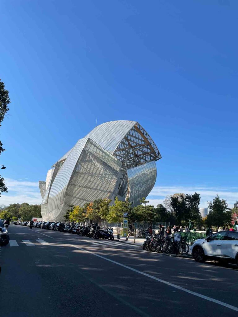 Admiring the architectural beauty of the Fondation Louis Vuitton Building is one of the non-touristy things to do in Paris