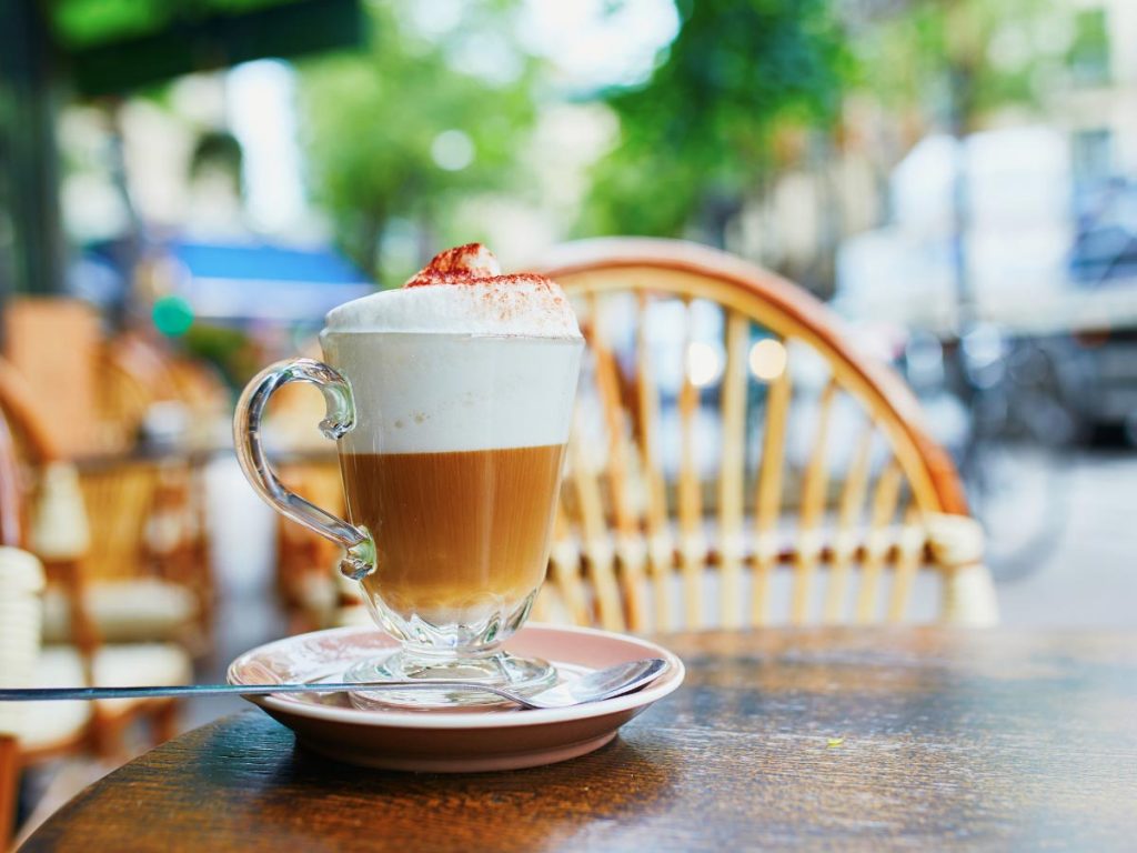 Warming  up with Hot Chocolate or Coffee at Parisian cafes is one of the best things to do in Paris when it rains.